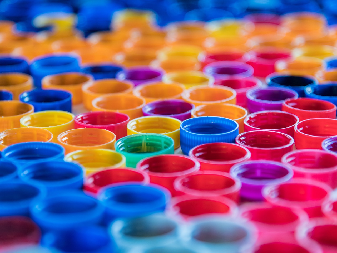 Colorful plastic bottle caps separated for recycling in Japan